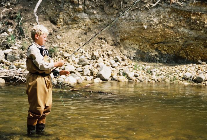 nick fishing - Laurie & Mikes Wedding - HF Bar Ranch Saddlestring, Wyoming